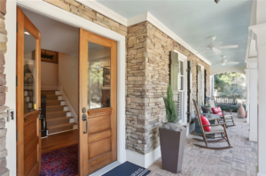 front door and porch stone brick walls