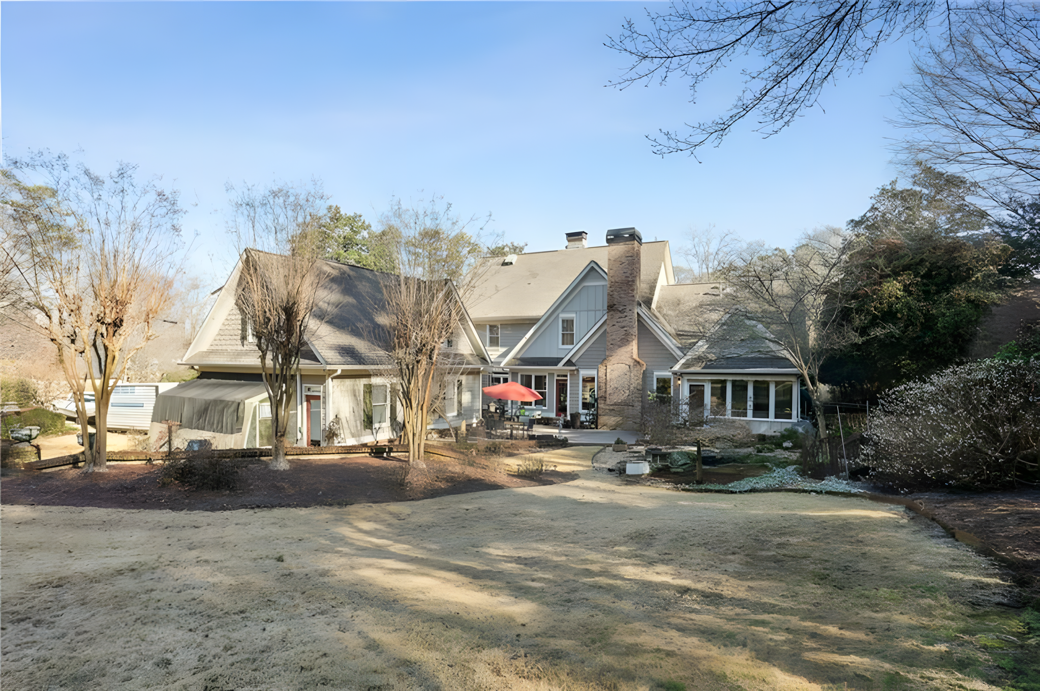 full rear exterior of grey home