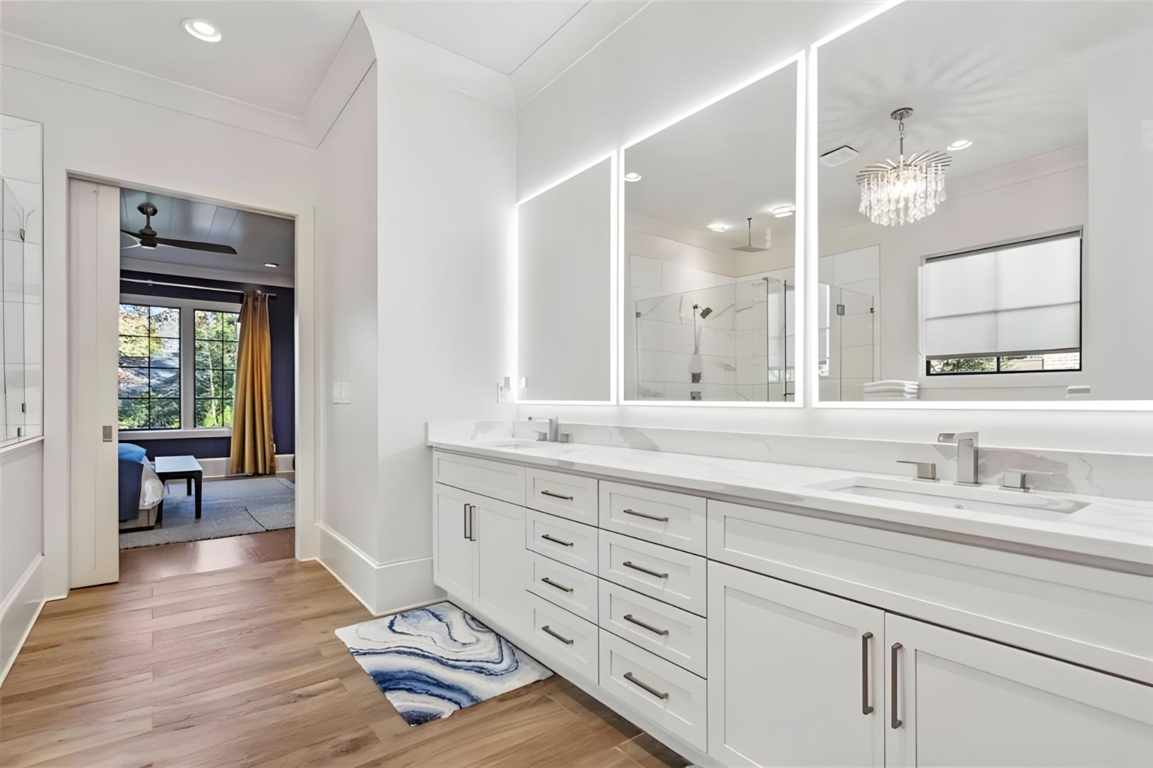 master bath white double sinks floating mirrors