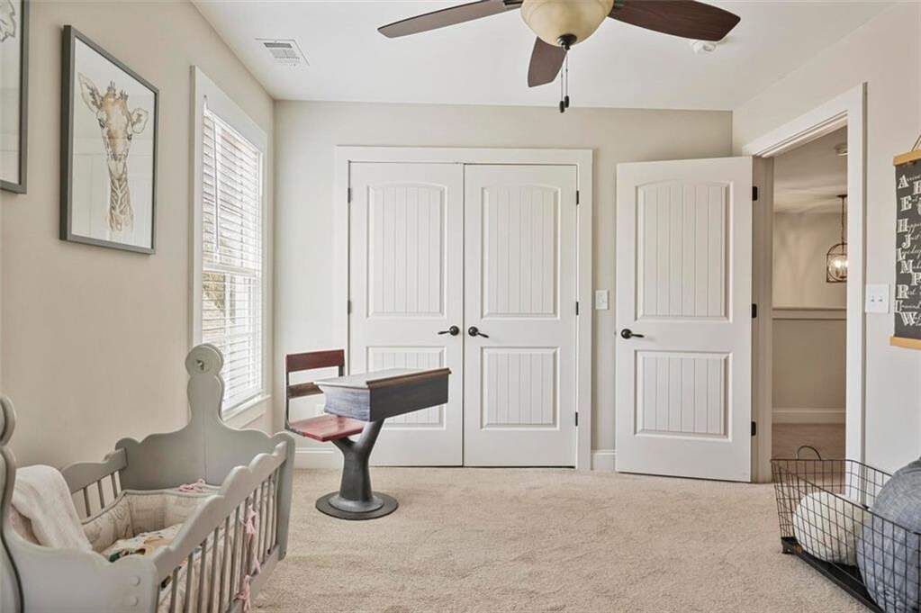 custom residence in historic Marietta district children's room with crib and school desk
