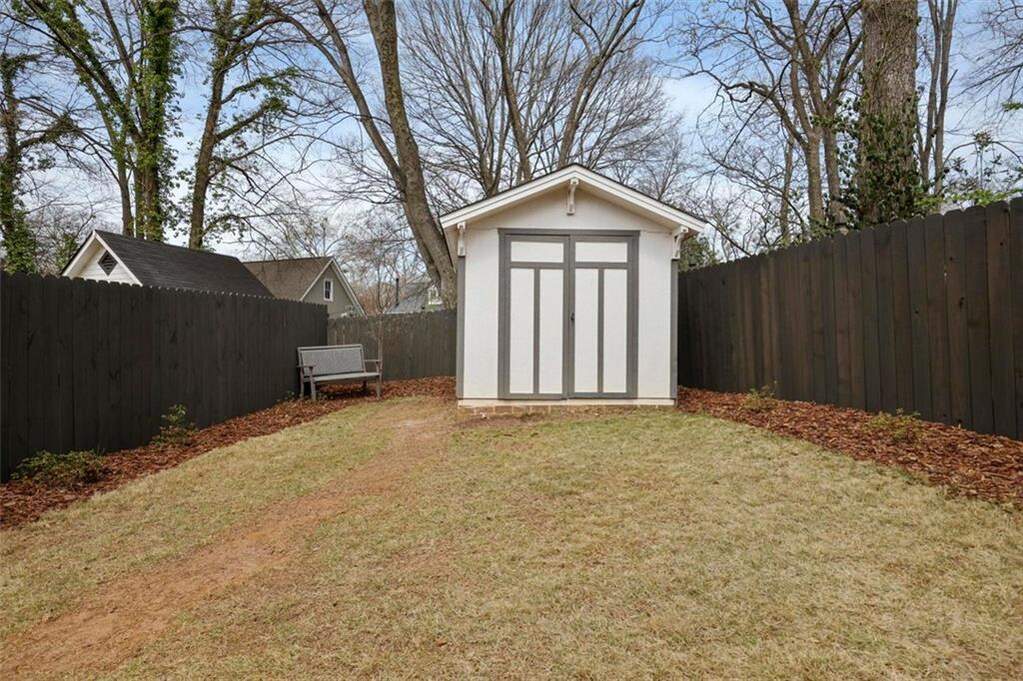 custom residence in historic Marietta district backyard shed